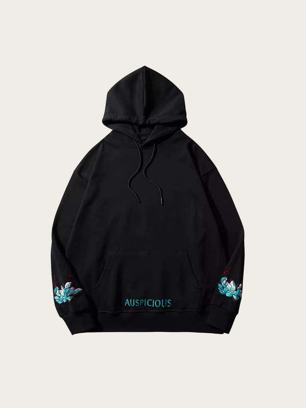 Black hoodie with floral designs on sleeves against a beige background