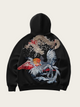 Black hoodie with dragon and phoenix design on a beige background