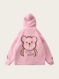 Pink children's hoodie with bear design on a light pink background