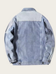 Light blue denim jacket on a white background