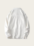 White jacket on a light beige background