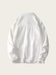 White jacket on a light beige background