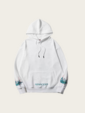 White hoodie with floral designs on sleeves and 'AUSPICIOUS' branding on a white background