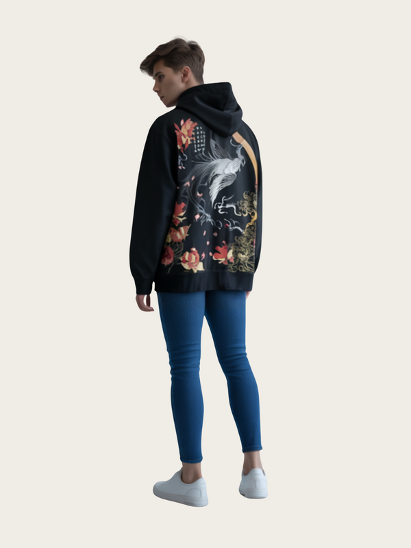 Person wearing a black hoodie with a colorful design on the back, standing against a plain background.