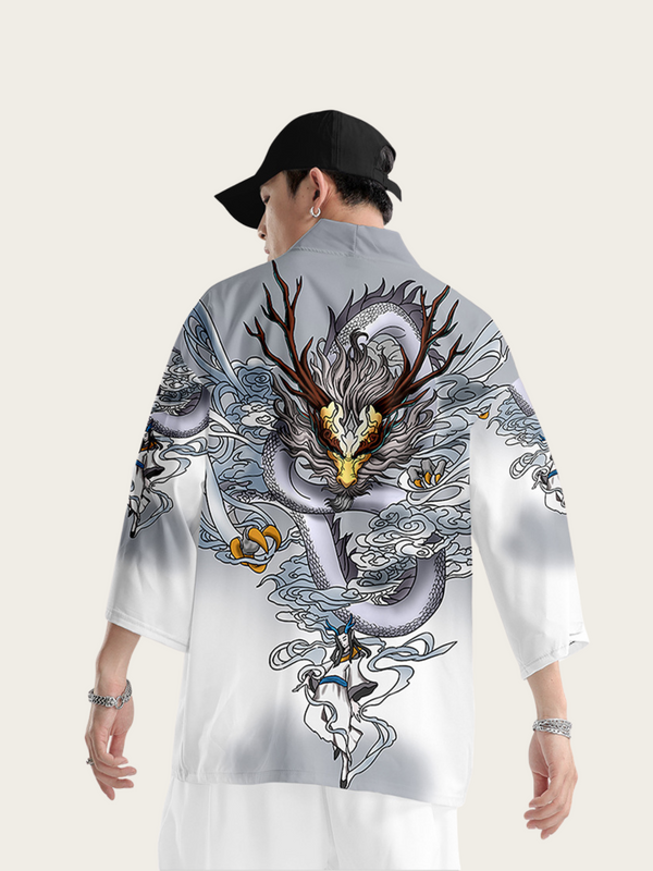 Person wearing a white shirt with a dragon design on a light gray background