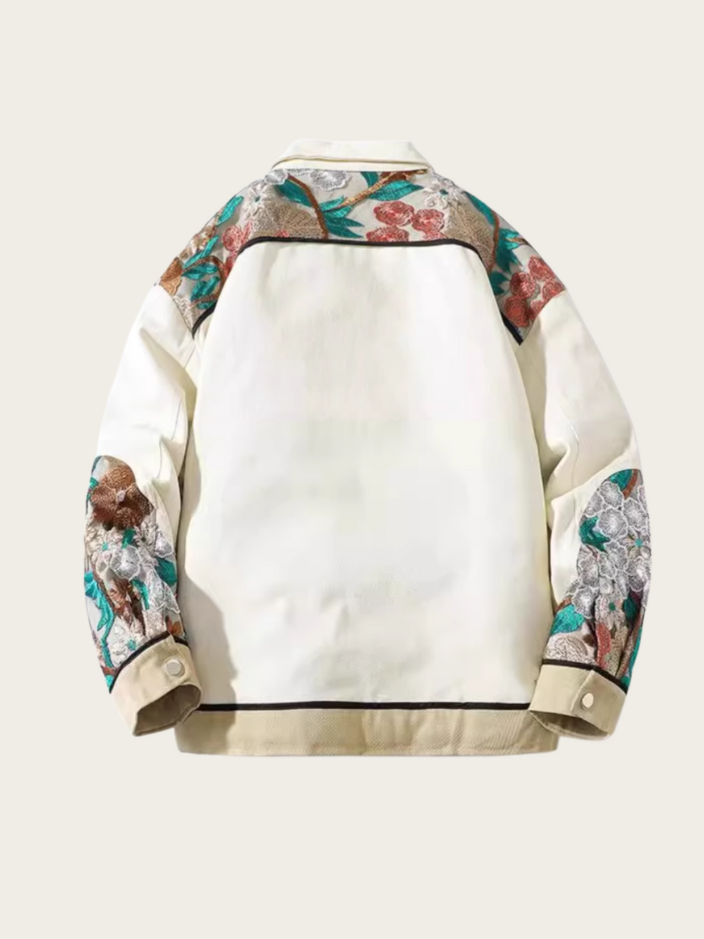 White jacket with floral sleeves on a beige background