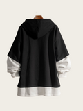Black and white layered hoodie on a mannequin against a white background