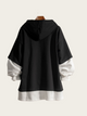Black and white layered hoodie on a mannequin against a white background