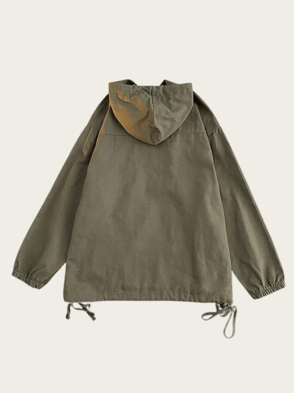 Green jacket with a hood on a beige background