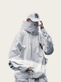Person wearing a white outfit with a hood and cap on a light gray background