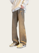 Person wearing beige mesh pants with a plain background