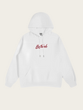 White hoodie with red text on a light beige background