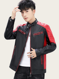 Person wearing a black and red leather jacket on a plain background