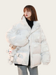 Person wearing a white puffer jacket with cartoon character design on a plain background