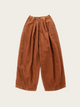 Brown wide-leg pants on a beige background