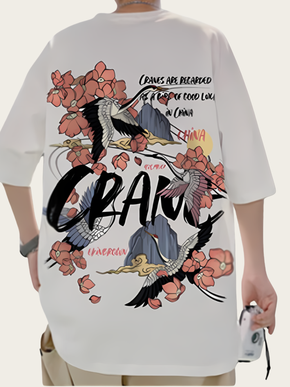 White t-shirt with crane design and text on a white background