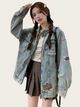 Person wearing a denim jacket with patches and a backpack on a plain background