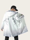 Person wearing a white coat with dragon designs on a plain background