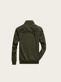 Green jacket on a beige background