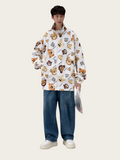Person wearing a white jacket with bear pattern and blue jeans on a white background