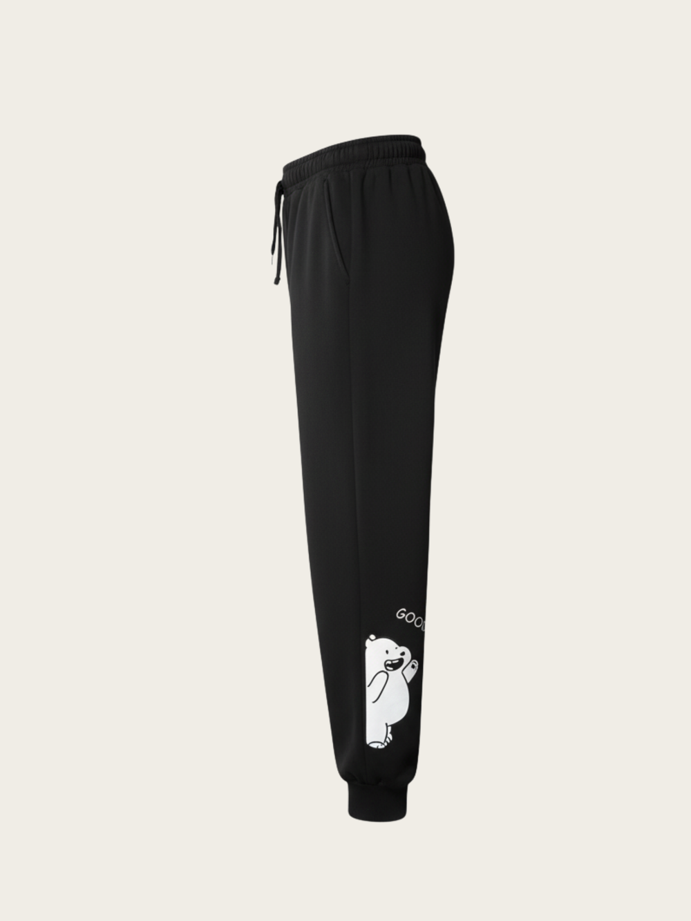 Black jogger pants with a white logo on a light gray background