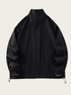 Black jacket on a beige background