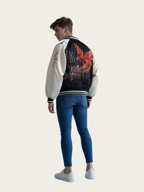 Person wearing a colorful varsity jacket with a white back, blue jeans, and white shoes on a light gray background.
