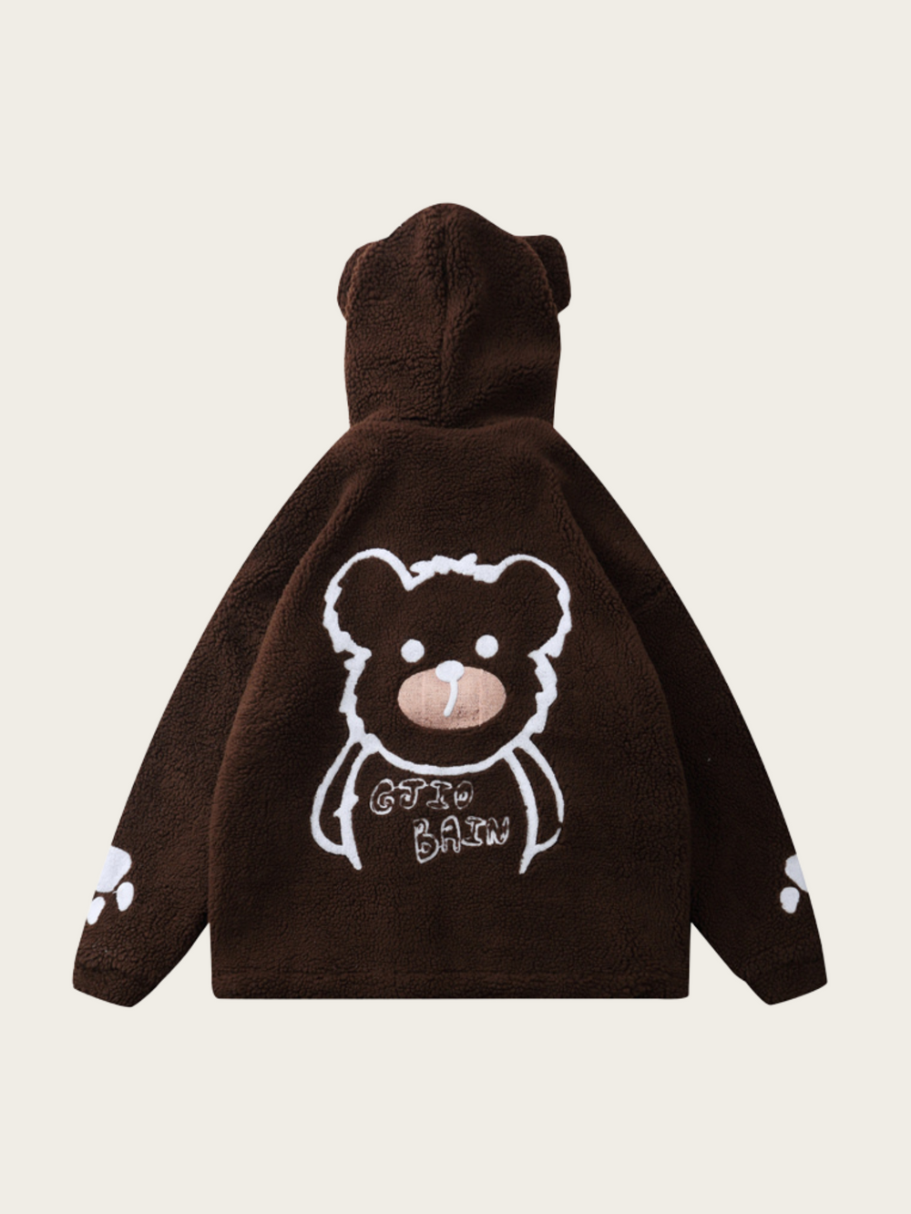 Brown hoodie with bear design on the back against a beige background
