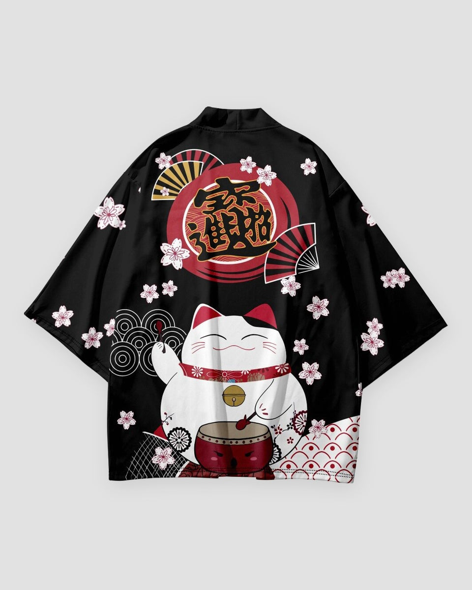 Back of the black haori with a red circle of gold characters, a white lucky cat with a red drum and pink cherry blossoms