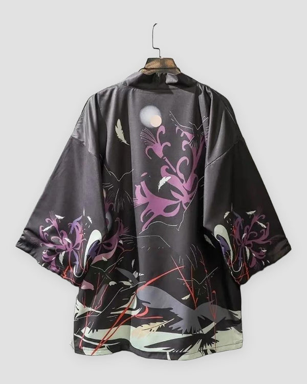 Charcoal haori cardigan with a white moon, ravens and purple spider lilies on a hanger, back view
