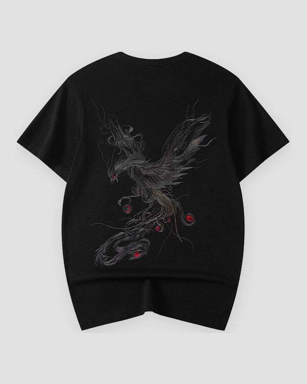 Back of the black tee with a large phoenix embroidered in gray and silver thread