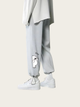 Light gray sweatpants with a small white graphic on a white background