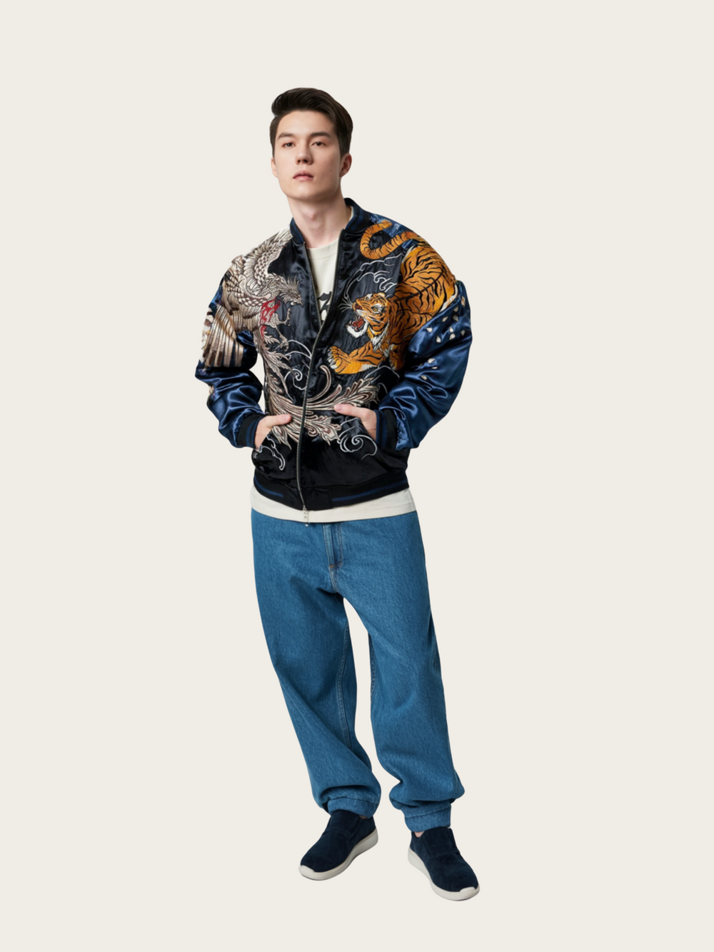 Person wearing a colorful patterned jacket and blue jeans on a white background