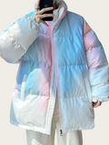 Person wearing a pastel-colored puffer jacket with a gradient effect.
