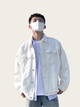 Person wearing a white denim jacket and face mask against a plain background