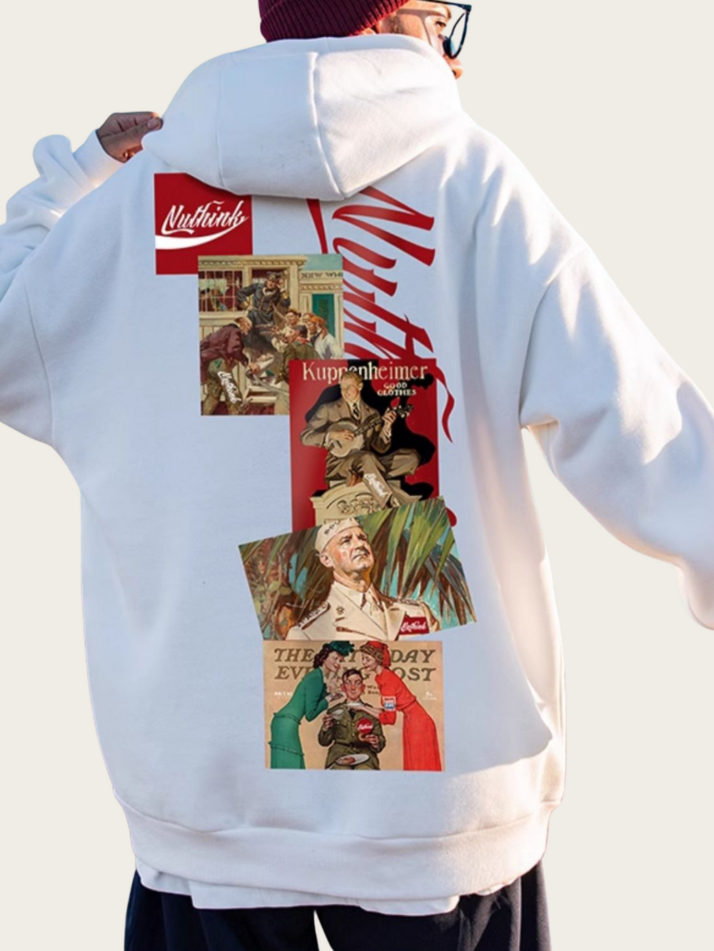White hoodie with graphic designs on the back, featuring a collage of images and text.