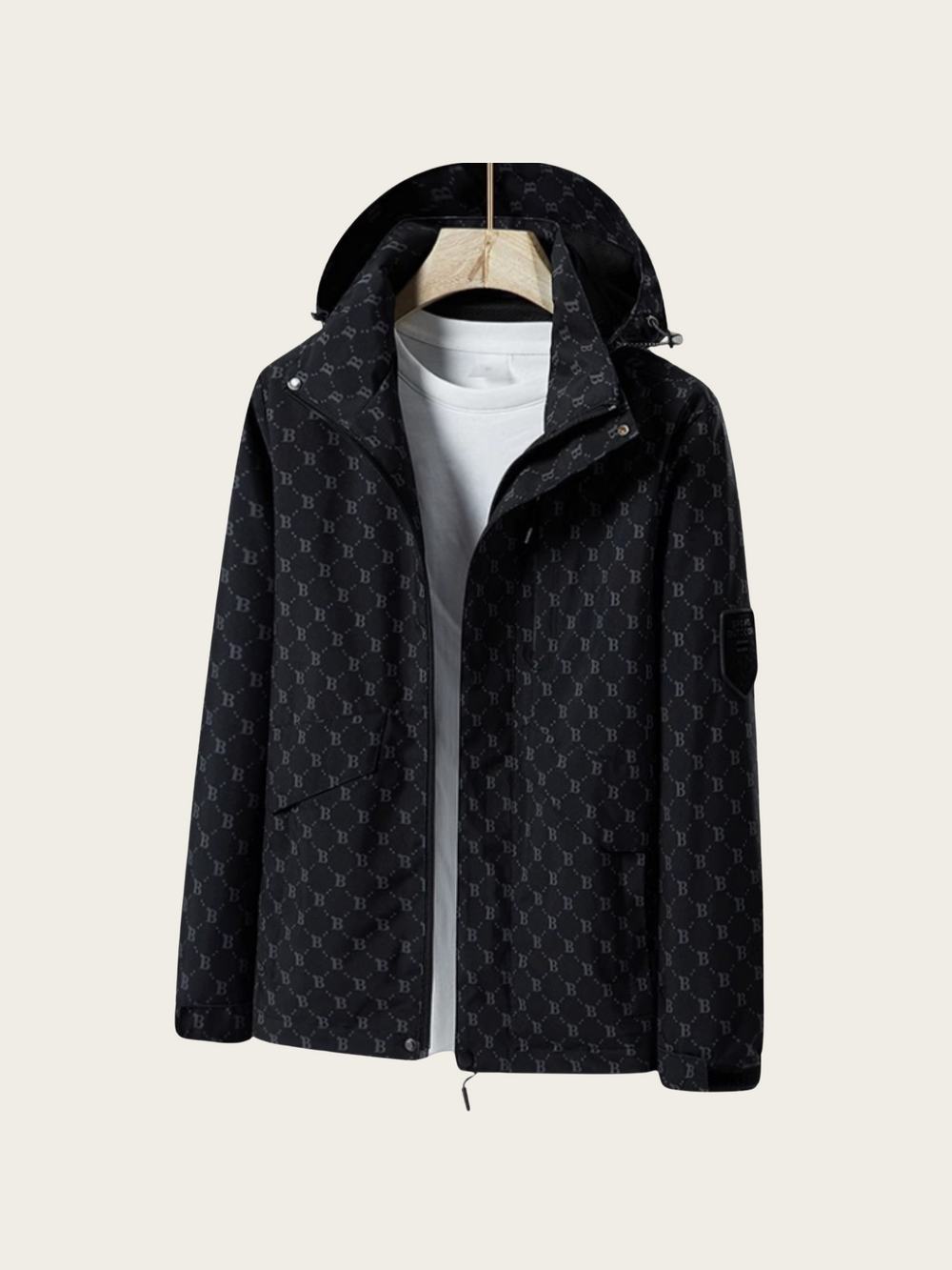 Black patterned jacket on a beige background