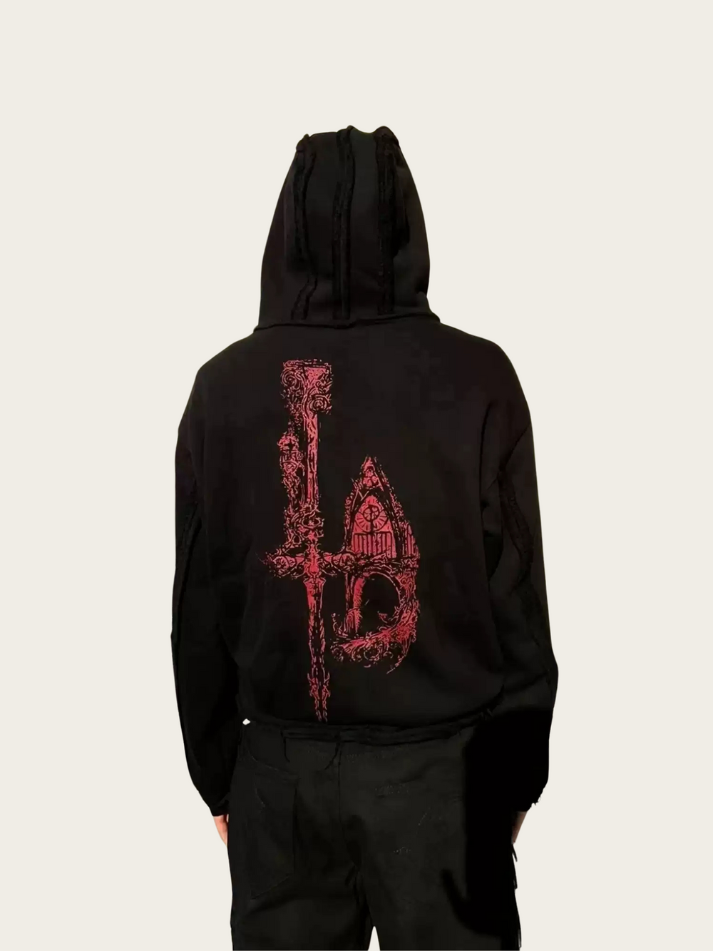 Black hoodie with red graphic design on the back against a light gray background