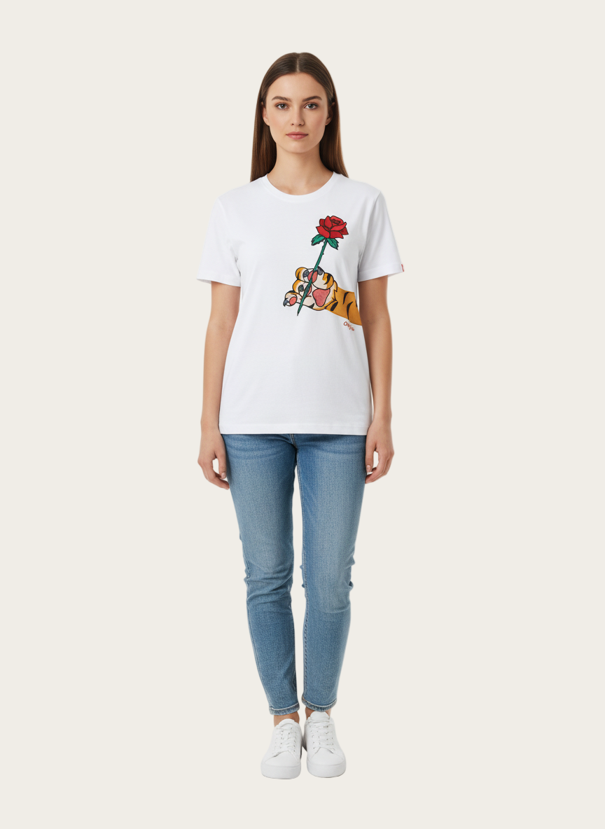 Woman wearing a white t-shirt with a graphic design on a white background