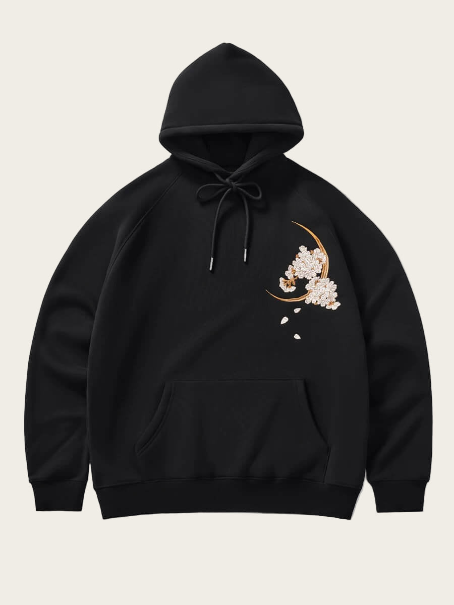 Black hoodie with floral design on a white background