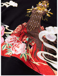 Embroidered fabric with traditional design featuring a phoenix, flowers, and clouds on a black background.