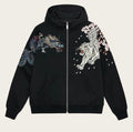 Black hoodie with dragon and tiger designs on sleeves against a white background