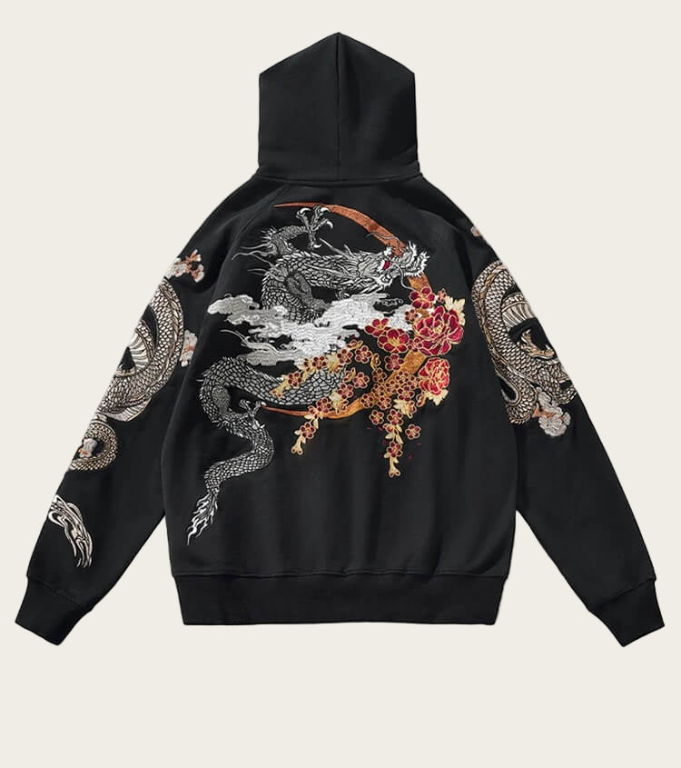 Black hoodie with dragon and floral design on the back against a white background