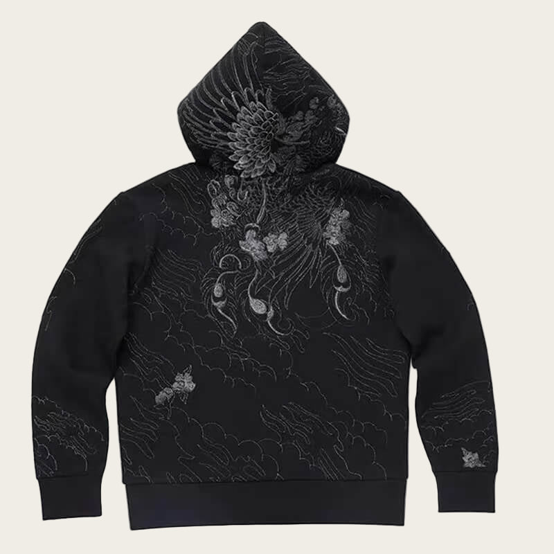 Black hoodie with intricate floral embroidery on a white background
