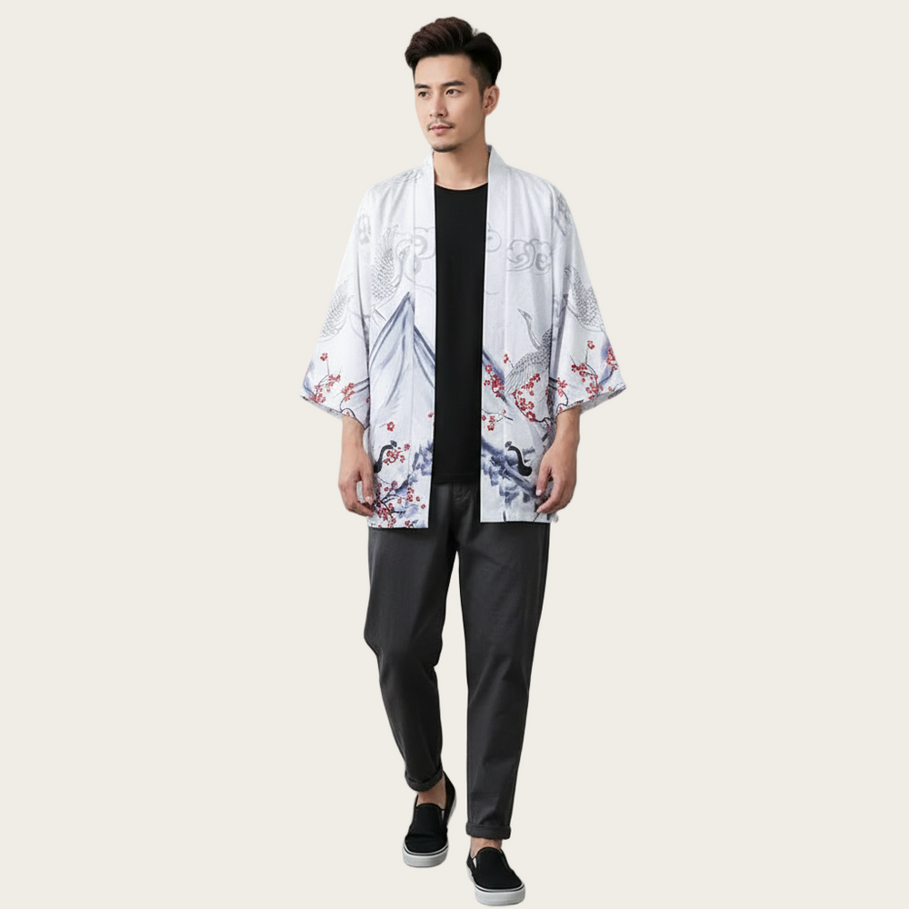 Man wearing a floral kimono over a black shirt and pants