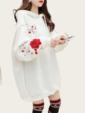 White hoodie with red rose design 
