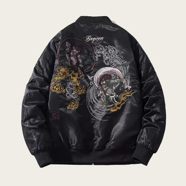 Black jacket with intricate designs and text on a white background