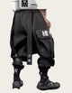Person wearing black pants