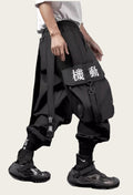 Person wearing black pants