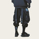 Person wearing black pants